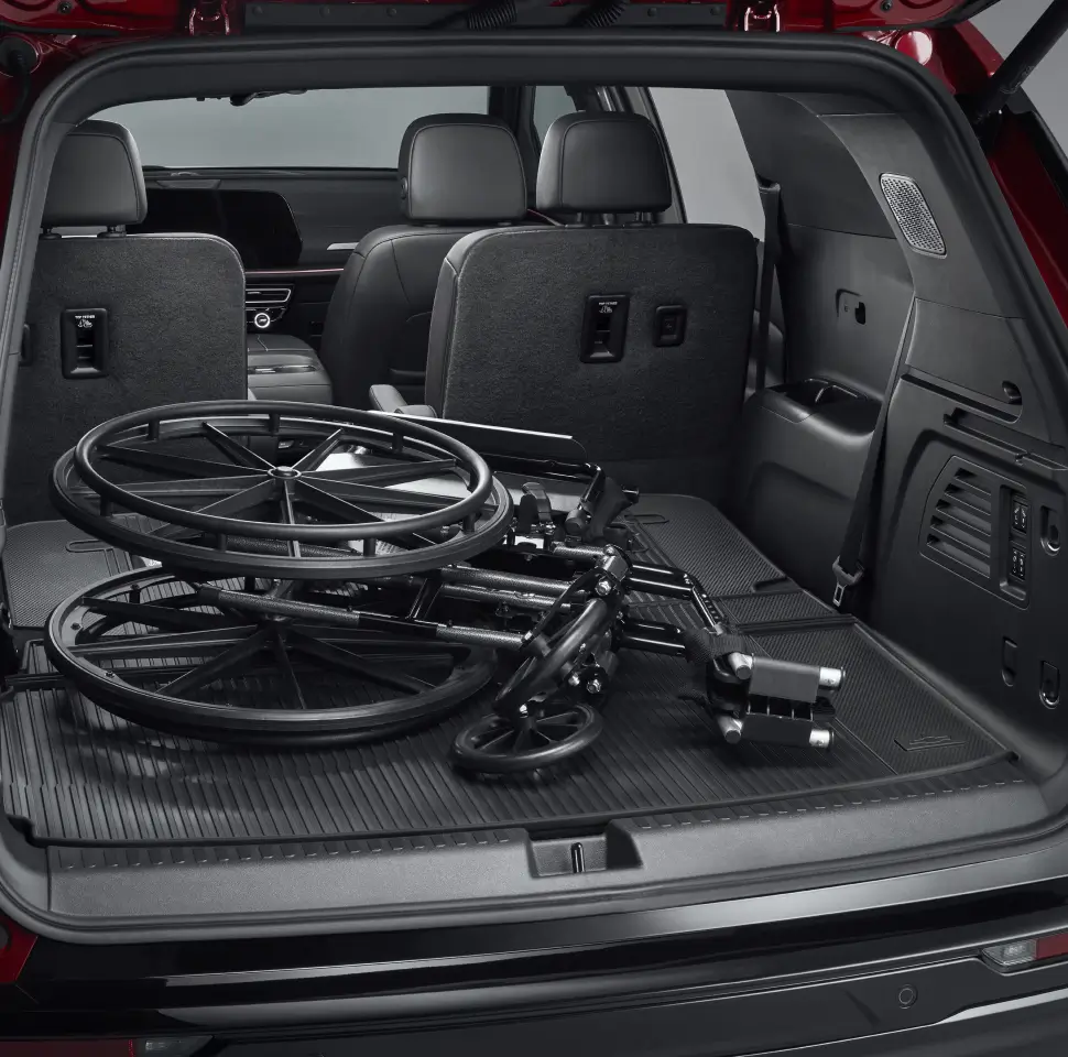 Chevy trunk open with wheelchair in back